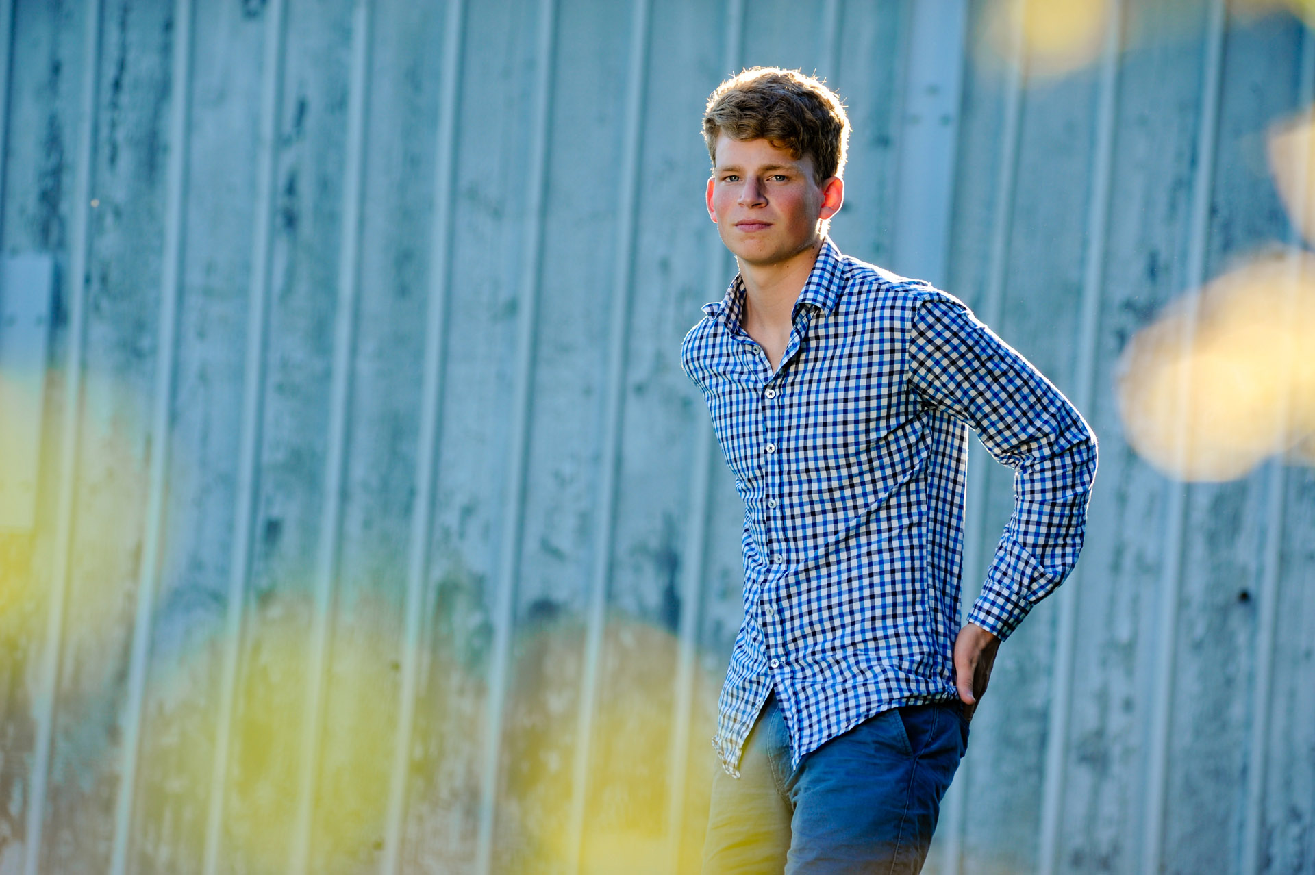 Troy, Michigan senior photographer's portrait of the high school senior posing for his senior pictures in Troy, Michigan.